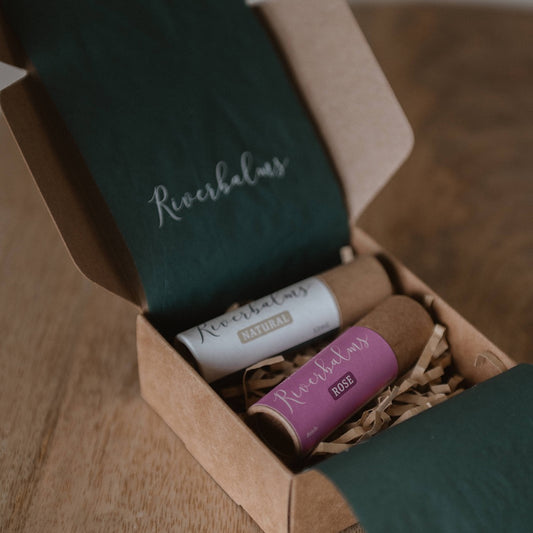 Kraft gift box displaying Riverbalms Cheek & Lip Tint + Plastic Free Lip Balm in Natural